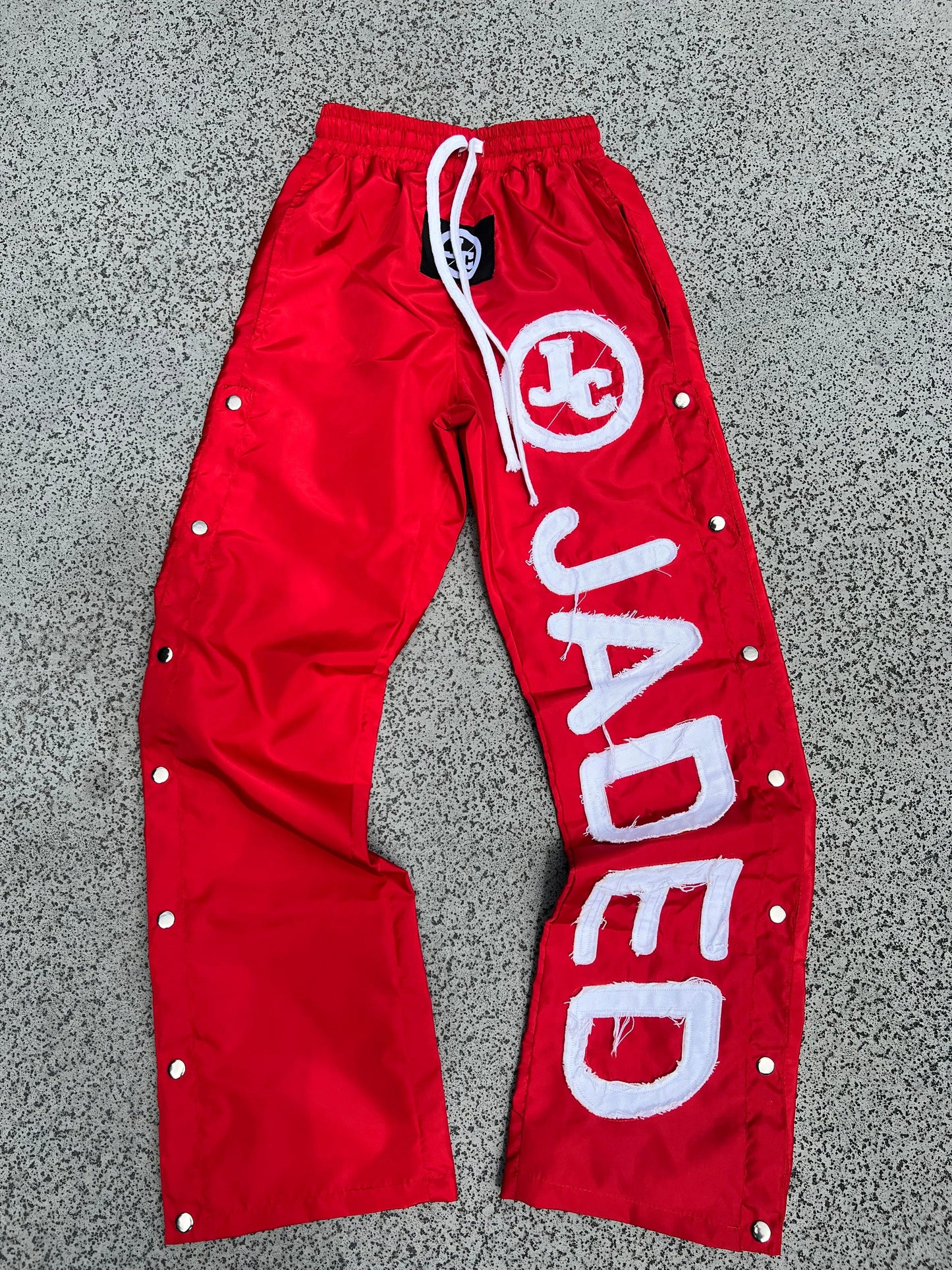 JADED WINDBREAKER PANTS RED