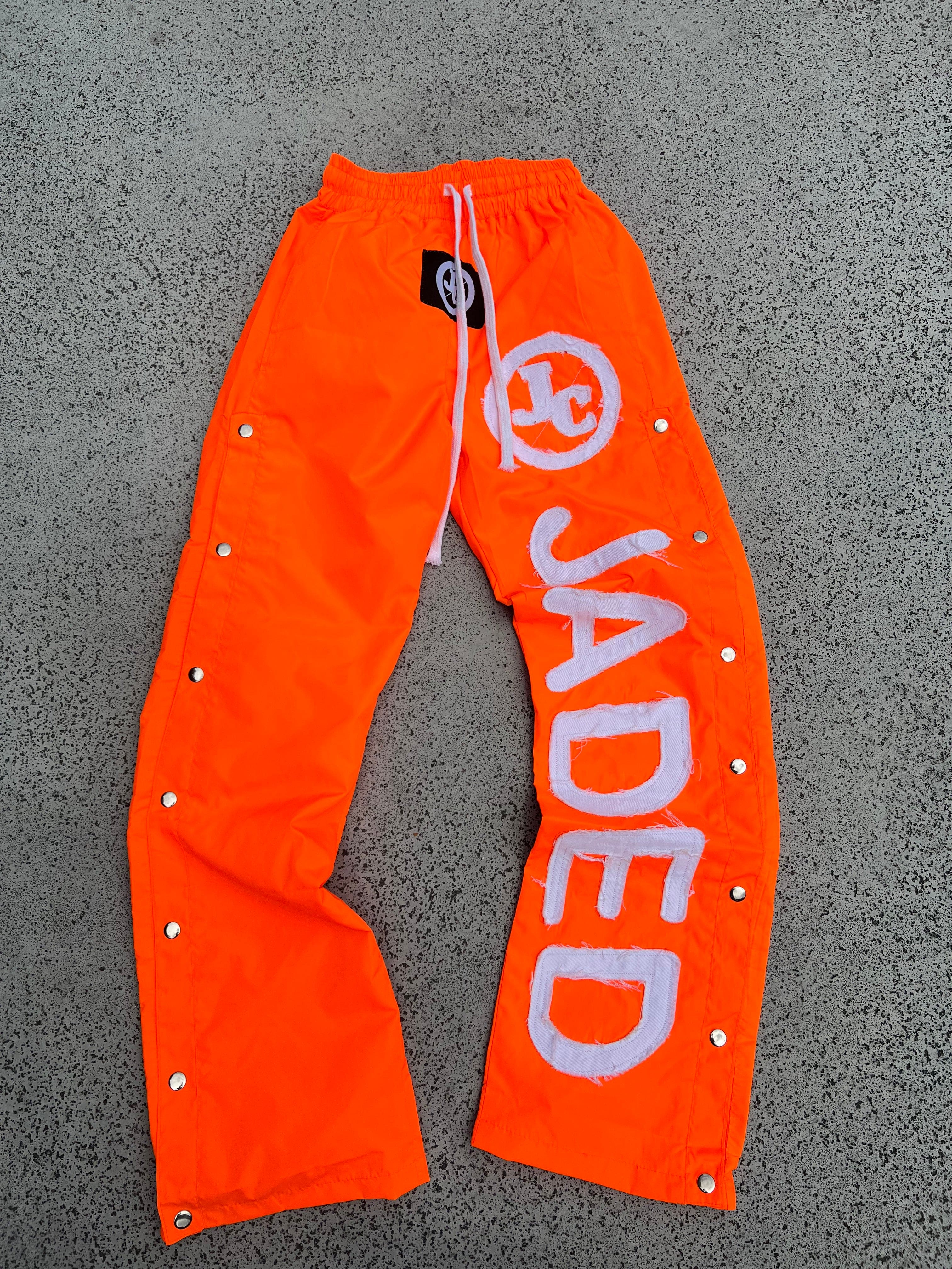 JADED WINDBREAKER PANTS ORANGE Jaded